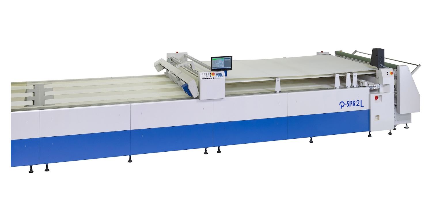 P- SPR2L fabric spreading machine with layup function. © Shima Seiki